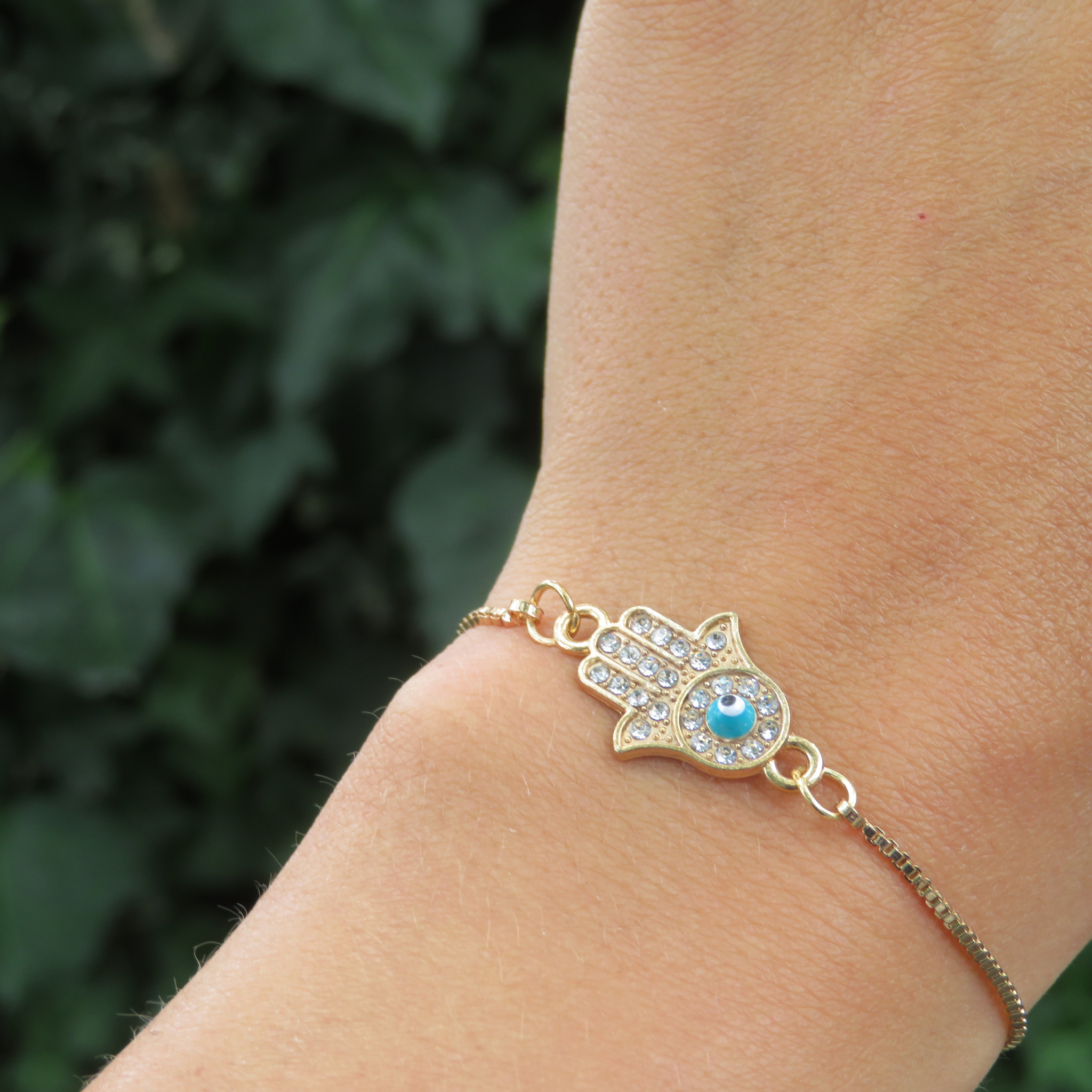 Hand with eye bracelet on sale